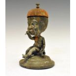 19th Century Britannia metal character figure counter bell formed as a seated child with a large