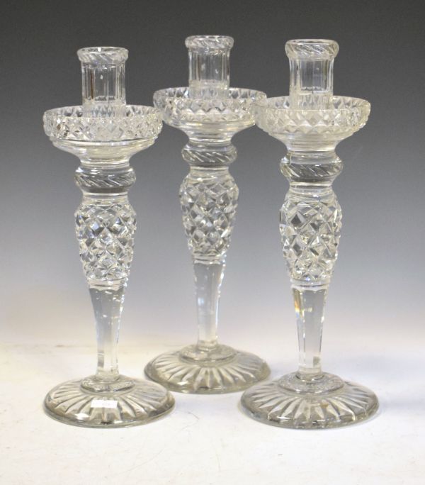 Set of three good quality cut glass candlesticks, 30cm high Condition: