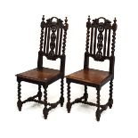 Pair of late 19th Century stained oak high back Carolean style dining chairs having barley twist