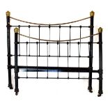 Late Victorian/Edwardian black painted iron double bed ends of tubular design with runners and green