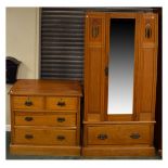 Early 20th Century Art Nouveau style wardrobe and dressing chest, the former with green glazed