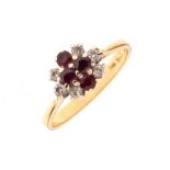 18ct gold dress ring set diamonds and ruby coloured stones, size N Condition: