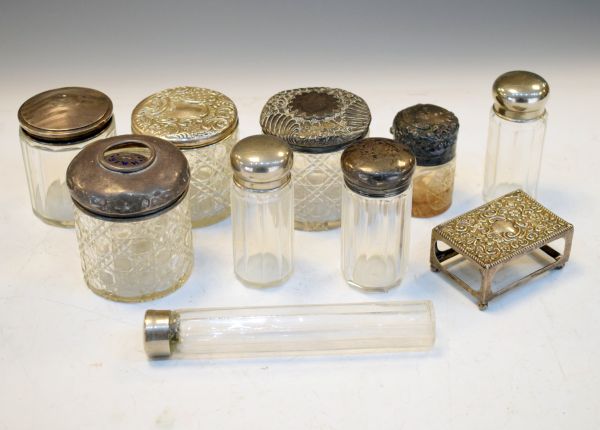 Group of glass dressing table items, most with silver covers to include: an example with enamelled
