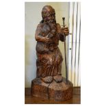 20th Century carved wooden sculpture of Abraham, the Old Testament figure seated with sacrificial