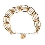 Gate link bracelet having a 9ct gold heart shaped clasp Condition: