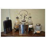 Small selection of plated wares comprising: a six bottle cruet on stand, two hip flasks, inkwell and