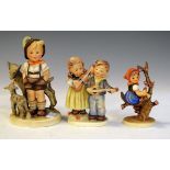 Three Goebel Hummel figures - Little Goat Herder, Happy Days and Apple Tree Girl Condition: