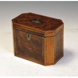 Georgian mahogany and crossbanded rectangular tea caddy having canted corners and hinged cover,