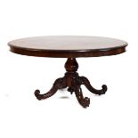 Victorian rosewood oval loo table on central bulbous turned support, raised on four outswept