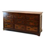 George III mahogany crossbanded oak 'Lancashire' mule chest, the hinged moulded crossbanded top over