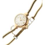Lady's 9ct gold Blancpain cocktail watch, the champagne dial with baton and Arabic numerals, on a