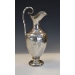 Late 19th Century Danish white metal jug or ewer of ovoid form with scroll handle, the body
