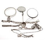 Group of assorted silver and white metal jewellery to include: two hinged bangles, charm bracelet,