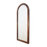 Mahogany framed wall mirror of arched design Condition: