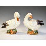 Pair of 20th Century pottery geese on naturalistic bases, 19.5cm high Condition: