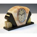 1930's period slate and marble mantel clock having oval dial and Arabic numerals, 11cm high