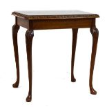 Mid 20th Century walnut occasional table having a quartered top on cabriole supports Condition: