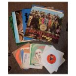 Small selection of records to include: Sergeant Peppers Lonely Hearts Club Band (The Beatles), Tommy