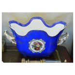 Large porcelain wine cooler in the Meissen taste of wavy edged oval form with gilt handles and