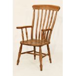 Late 19th/early 20th Century Thames Valley elm and beech lath back elbow chair Condition: