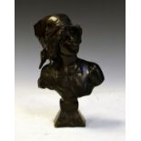 Bronze bust of a maiden wearing a headscarf on spreading square socle Condition: