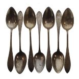 Set of six late 19th Century Danish white metal dessert spoons, each with bright cut engraving,