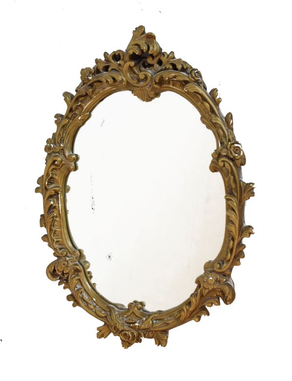 Gilt framed oval wall mirror of foliate scroll design Condition: