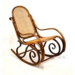 Early 20th Century bentwood and cane seated rocking chair in the manner of Thonet Condition: