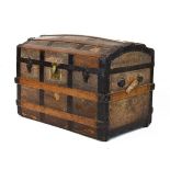 Early 20th Century dome top sea chest or trunk with wooden ribs and studded iron strap work