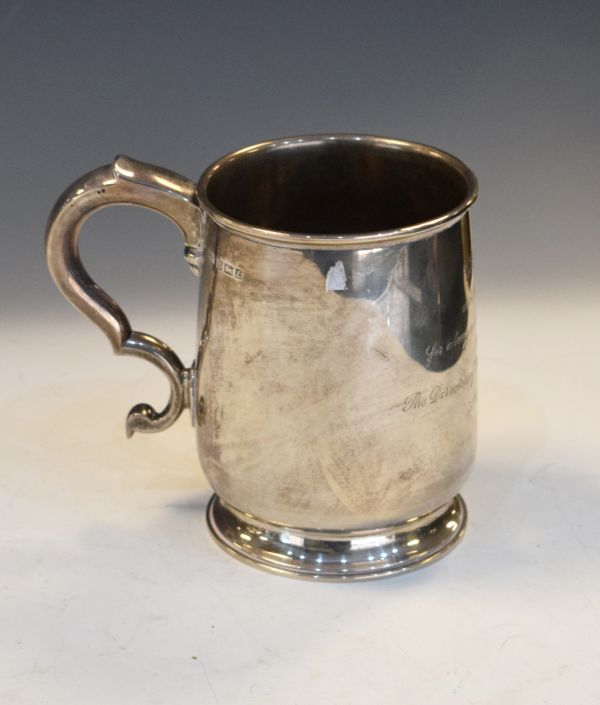 Elizabeth II silver mug, of slightly bulging form with kick handle, Birmingham 1960, 14.2ozt