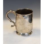 Elizabeth II silver mug, of slightly bulging form with kick handle, Birmingham 1960, 14.2ozt