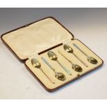 Cased set of six George V enamelled silver demi tasse coffee spoons, each with silver gilt bowl,