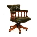 Reproduction tub back swivel office chair of 'Captains Bow' design with deep buttoned green