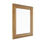 Modern gilt framed wall mirror, the bevelled rectangular plate within fluted surround Condition: