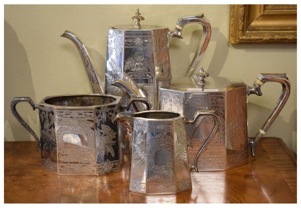 Late 19th/early 20th Century silver plated four piece tea set having fern, floral and butterfly