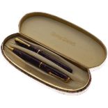 Conway Stuart celluloid fountain pen and matching propelling pencil, cased Condition: