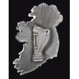 20th Century Waterfold glass ornament in the shape of Ireland with an engraved harp and acid