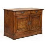 French fruitwood side cabinet, the rectangular top over two short frieze drawers and two panelled