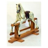 Dappled grey rocking horse by Haddon Rockers, Wallingford, Oxon, on pitch pine base Condition: