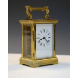 Early 20th Century lacquered brass carriage timepiece with white Roman dial and single train