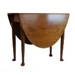 Mid 18th Century style mahogany drop leaf gateleg dining table, the oval flaps on four club legs and