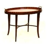 Early 20th Century inlaid mahogany two handled galleried tray, the field with central shell