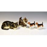 Two Winstanley pottery cats with glass eyes, together with two Beswick Beagles - Champion Wendover