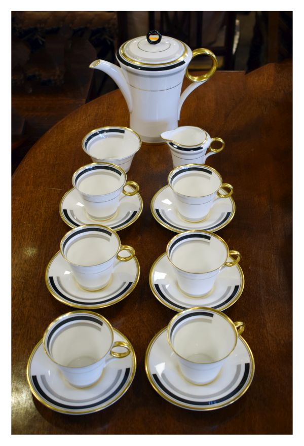 Shelley bone china six person coffee set having black, grey and gilt decoration Condition: