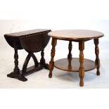 20th Century oak circular two tier occasional table, together with a small reproduction oak