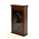 Georgian style mahogany table top/wall cabinet, the glazed door with wooden tracery enclosing two