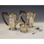 Pair of George V silver hot water jugs, each with brown Bakelite handle, Birmingham 1934, together