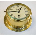 Sewill of Liverpool brass ships bulk head clock, the white dial with subsidiary seconds dial and