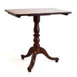 19th Century mahogany tripod occasional table, the canted oblong top on turned stem and three