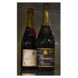 Bottle of Moet & Chandon Premier Cuvee Champagne and one other Lanson Black Label bottle of